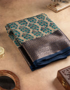 Chanderi Cotton Saree in Beige with Turquoise Blue Floral Prints and Navy Blue Border