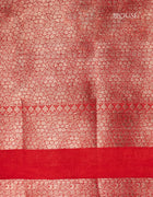 Semi Banarasi Silk Saree in Emerald Green with Silver Butta Motifs and Red Contrast Zari Border