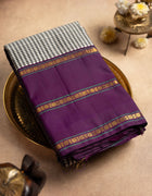 Pure Kanchipuram Saree in Royal Purple with Black and White Checks and Golden Zari Stripes